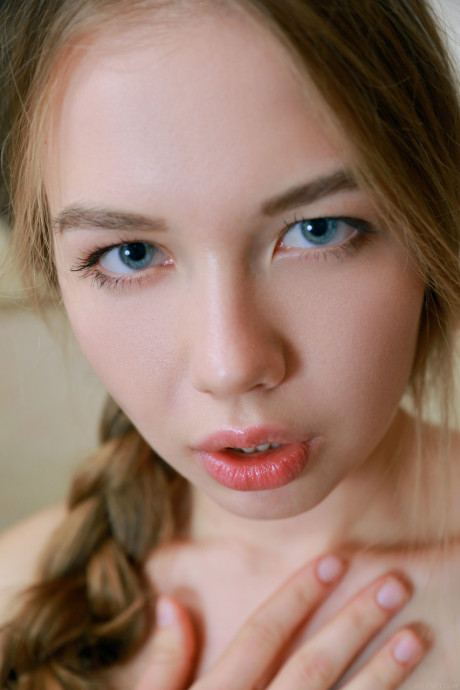 Humongous titted Russian teen Camilla Stan strips down nude and takes a hot shower