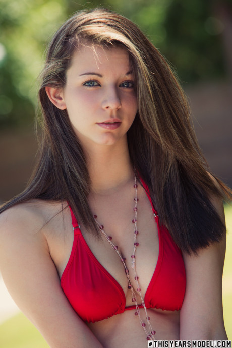 Gorgeous whore girl girl Penny Kate undresses in a backyard location