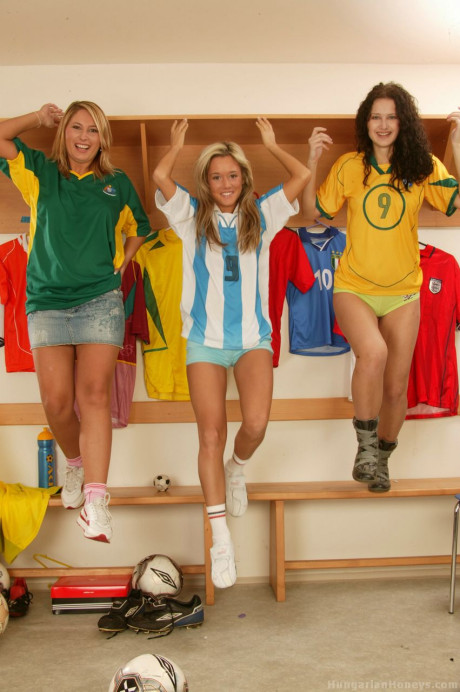 Young teenie lesbians dildo horny pussies during a 3some in football locker room