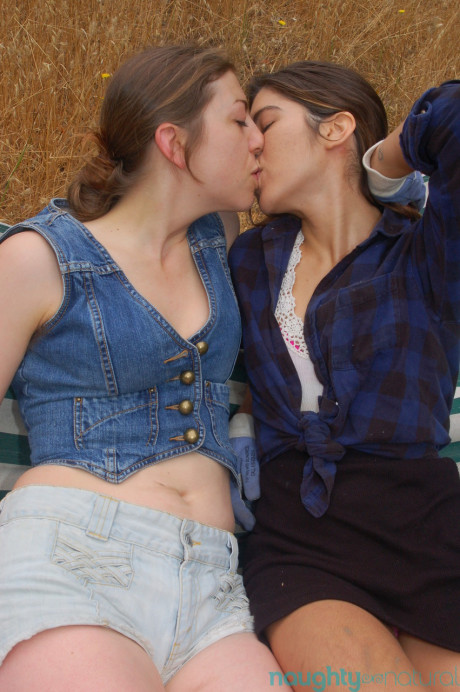 Ravishing pretty amateurs Felix & Sylvie undress & kiss each other's silky pussy outdoors