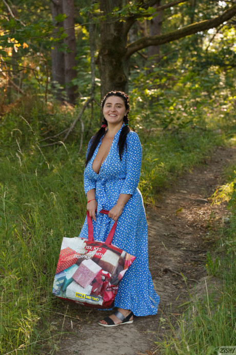 Stacked babe Vyeta Mustafina shows off her stunning monstrous melons outdoors