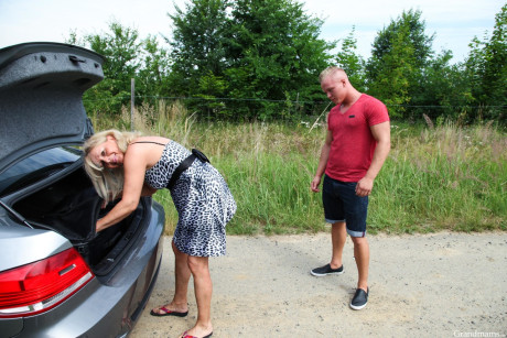 Cougar chick Mia gets both her holes plowed by a yellow-haired teen man man outdoors