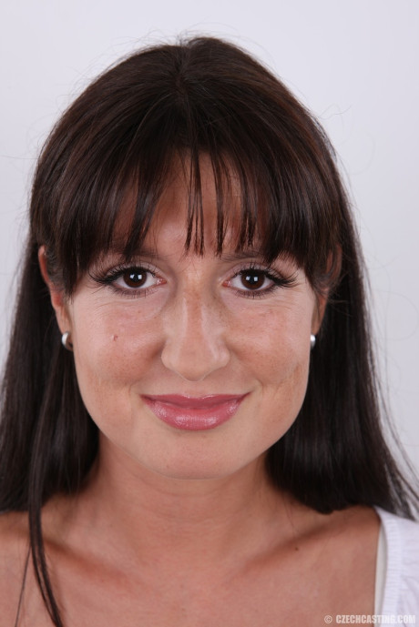 Brunette first timer Veronika gets totally undressed before sitting on a stool