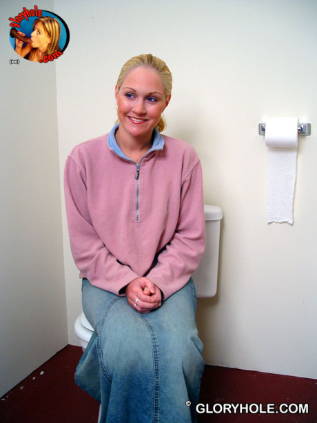 Blondy whore gf chick Jamie sits on the toilet and sucks a ebony gloryhole dong