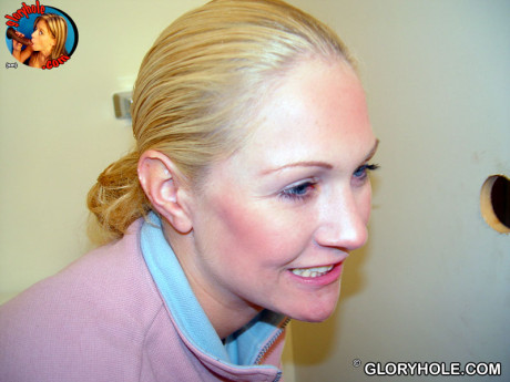 Blondy whore gf chick Jamie sits on the toilet and sucks a ebony gloryhole dong