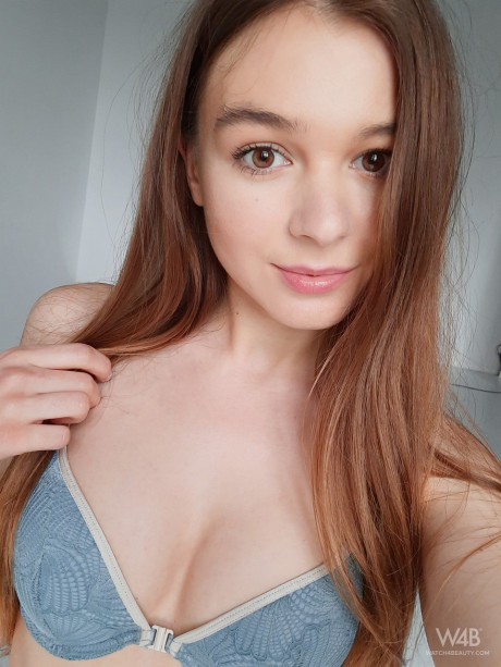 Young with small melons Stefani unveils her round booty and poses in a solo