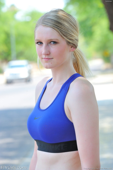 Delightful teenie jogger Summer reveals her attractive figure and poses in the park