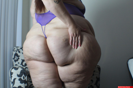 Amateur whore gf woman displays her giant butt and thunder thighs in revealing undies