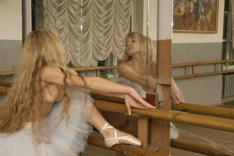 Unclothed ballerina Alla B shows off her small breasts and her giant behind