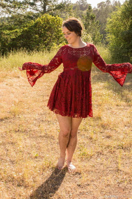 Short brunette Harley Hex undresses in nature & flaunts her bushy pierced twat