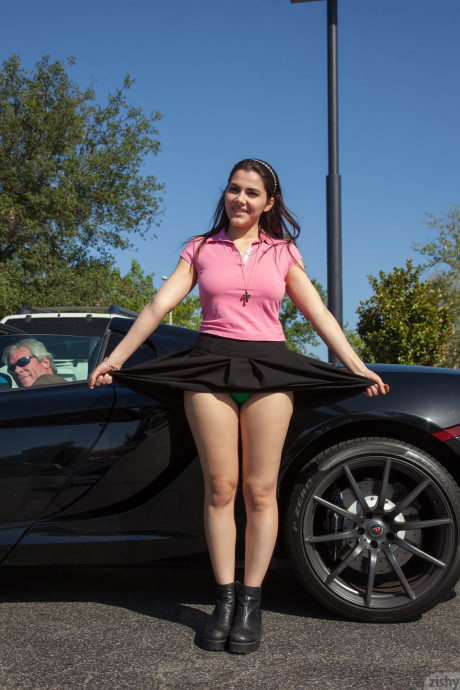 Amateur model Valentina Nappi exposes her thong clad booty in public places