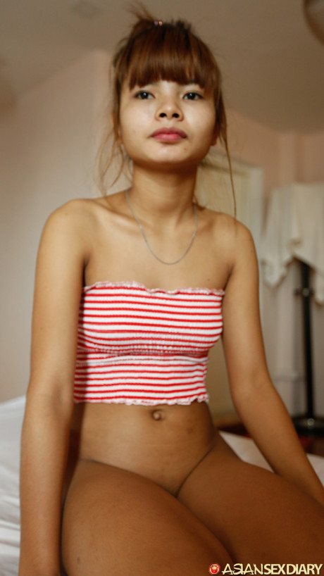 Beautiful fine asian teen Mildred B	flaunts her tiny breasts as she gets nailed in POV