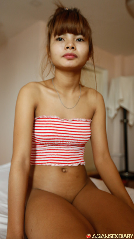 Beautiful fine asian teen Mildred B	flaunts her tiny breasts as she gets nailed in POV
