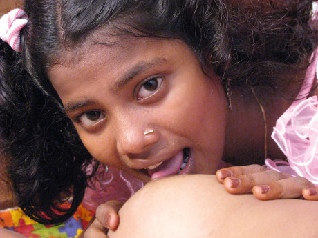 Indian lesbians tongue kiss before licking and toying vaginas
