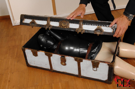 Sexy boxed rubber-clad babe Latex Lucy gets her vagina filled on a glass table