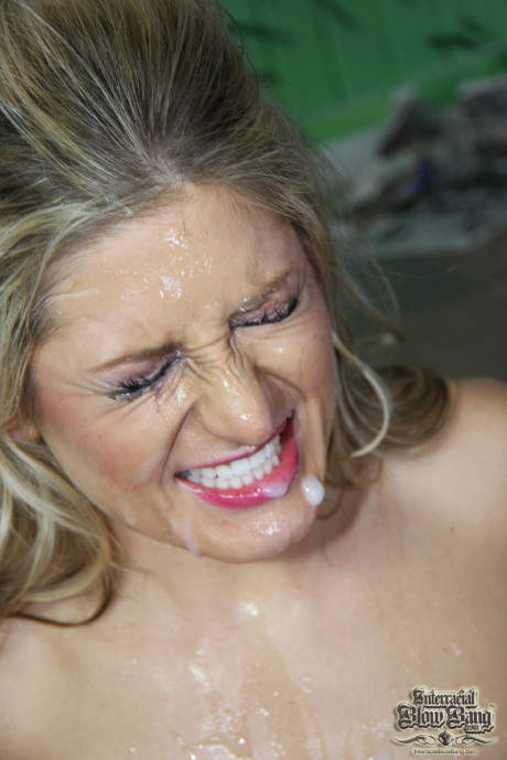 Hot yellow-haired girl Paris Gables gets chunky facials in interracial bukakke action