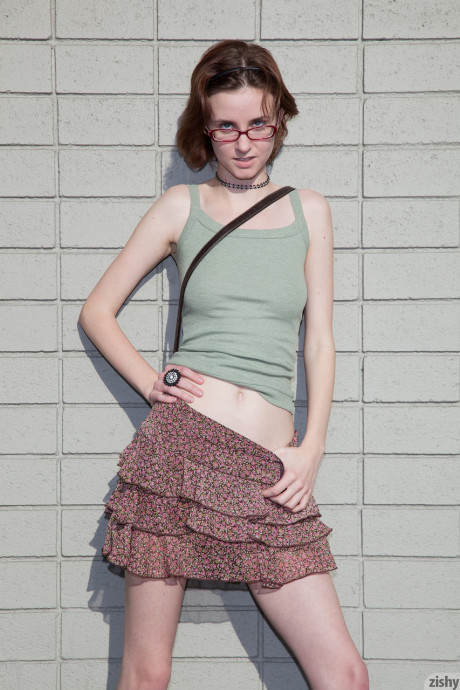 Innocent amateur babe Jay Taylor flashes her panties while posing outside