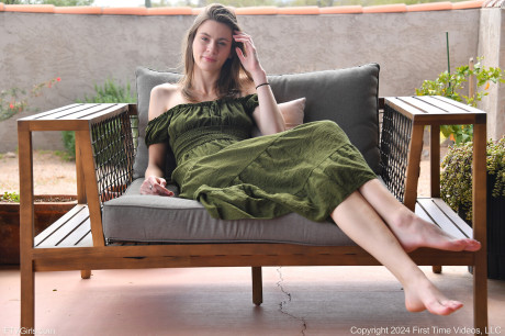 Brunette first timer Lily slips a vibrator in her shaved cunt